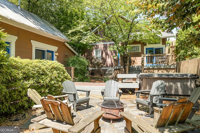 view of patio / terrace with a fire pit