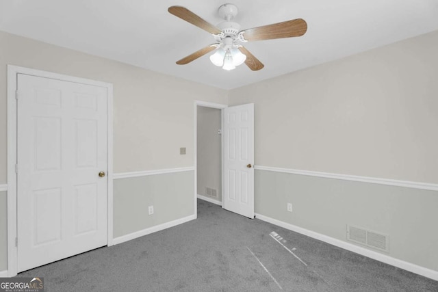 50 Riverside Ct, Hampton, GA 30228 - unfurnished bedroom with carpet and a ceiling fan