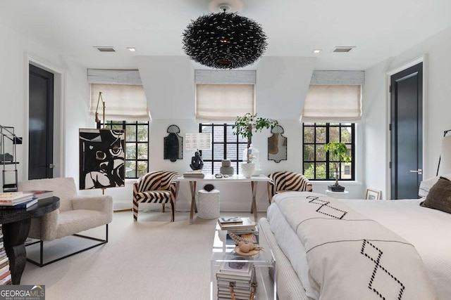 bedroom featuring recessed lighting, visible vents, and multiple windows