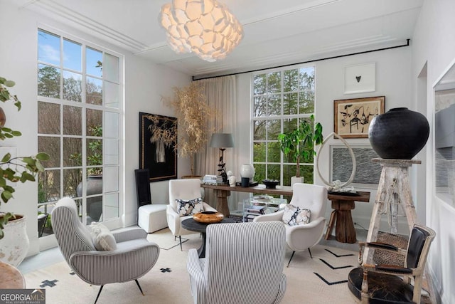 sitting room with floor to ceiling windows