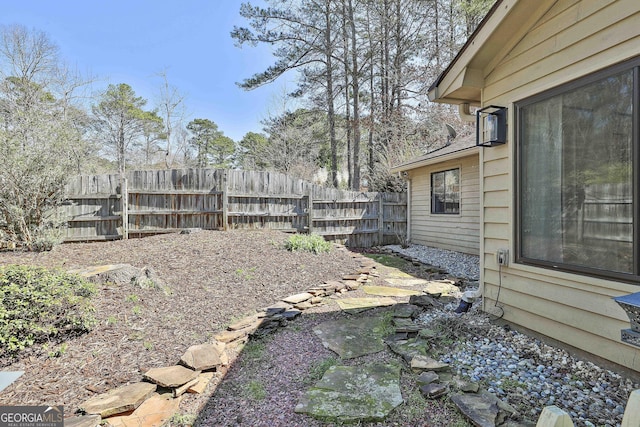 view of yard with fence