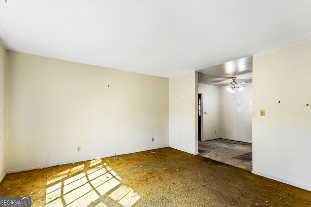 unfurnished room with a ceiling fan