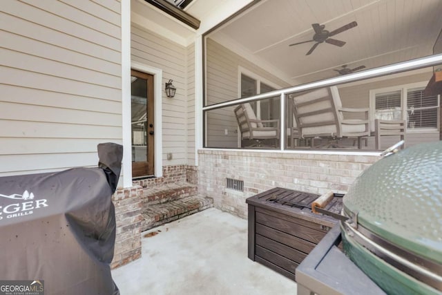 view of patio featuring ceiling fan