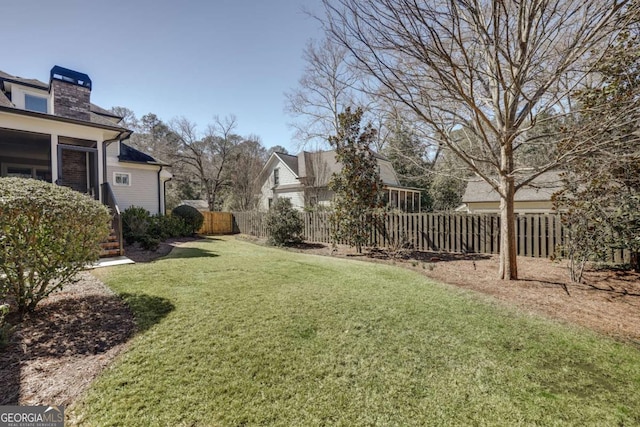 view of yard with fence