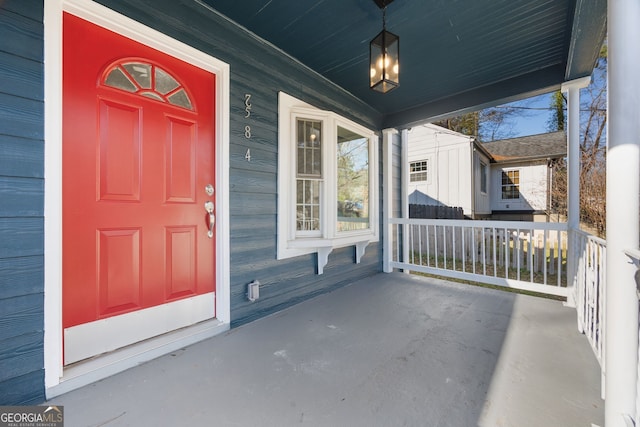 entrance to property with covered porch