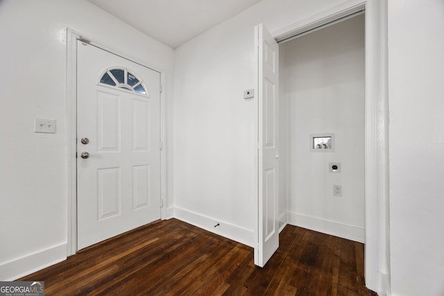 entryway with baseboards and dark wood-style flooring