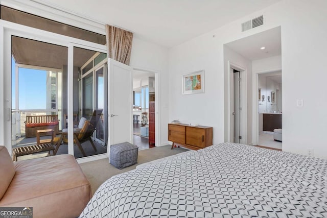 bedroom featuring visible vents and carpet flooring