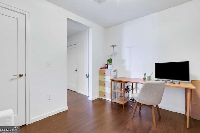 office with wood finished floors and baseboards