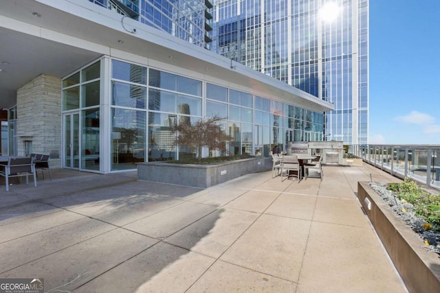 view of patio featuring outdoor dining area