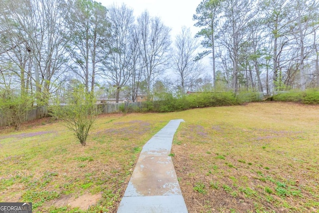 view of yard with fence