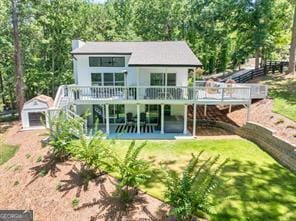 6505 Samoa Way, Flowery Branch, GA 30542 - rear view of property with a wooden deck, stairway, and a patio area