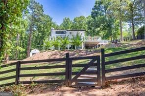 view of gate featuring fence