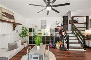 6505 Samoa Way, Flowery Branch, GA 30542 - living area featuring a ceiling fan and wood finished floors