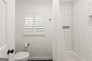 6505 Samoa Way, Flowery Branch, GA 30542 - bathroom featuring toilet and shower / bath combo