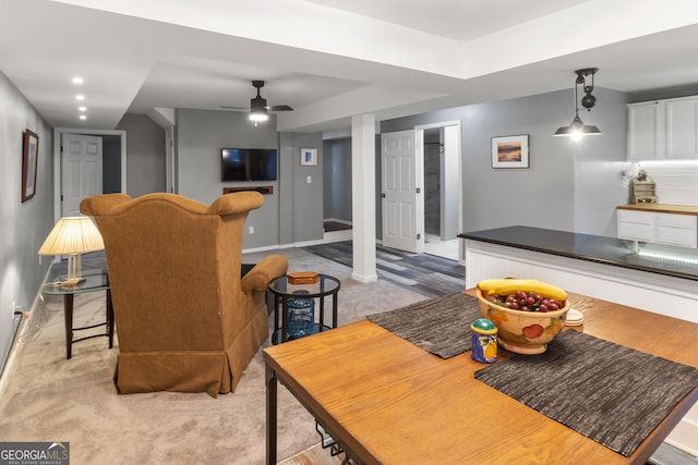 living room featuring recessed lighting, baseboards, and ceiling fan