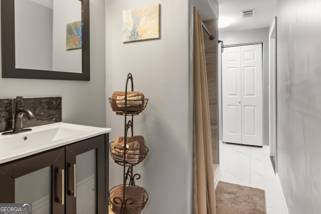 full bath with visible vents, marble finish floor, vanity, and a shower with shower curtain