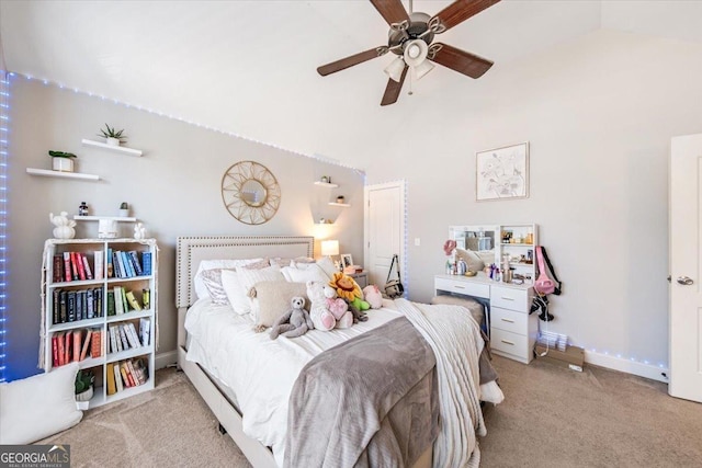 carpeted bedroom featuring high vaulted ceiling, baseboards, and ceiling fan