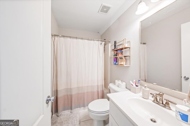 full bathroom featuring vanity, visible vents, curtained shower, tile patterned floors, and toilet