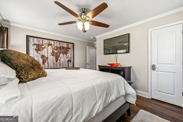 bedroom with ceiling fan, baseboards, wood finished floors, and ornamental molding