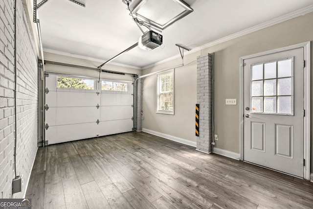 garage featuring a garage door opener and baseboards