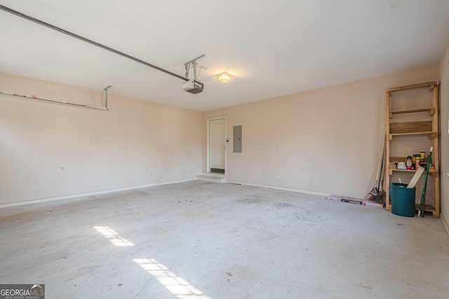 garage featuring electric panel and a garage door opener