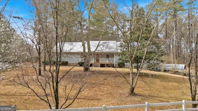 single story home with fence