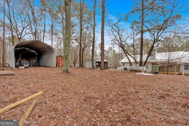 view of yard featuring a detached carport