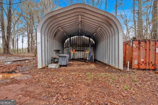 view of outdoor structure with a carport