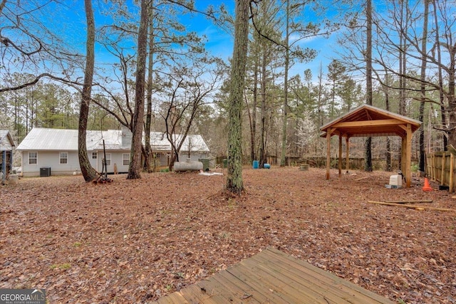 view of yard with a gazebo and central AC unit