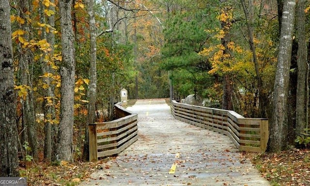 surrounding community with a view of trees