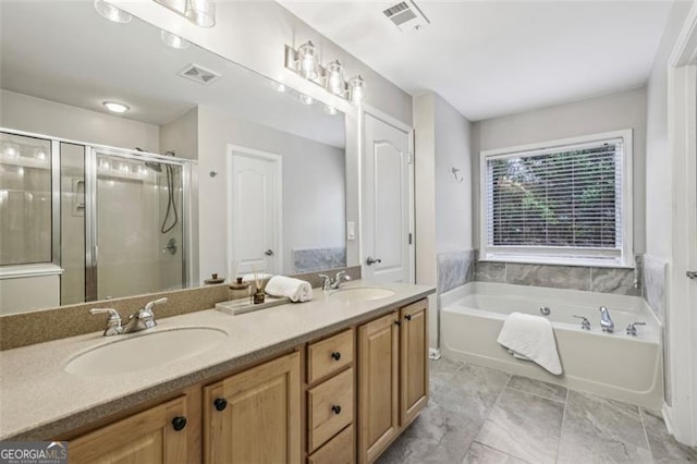 full bath with a sink, visible vents, a garden tub, and a stall shower