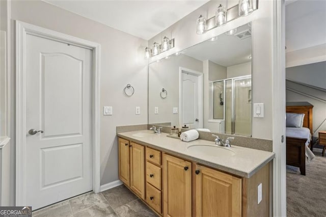 bathroom with double vanity, a sink, connected bathroom, and a shower stall
