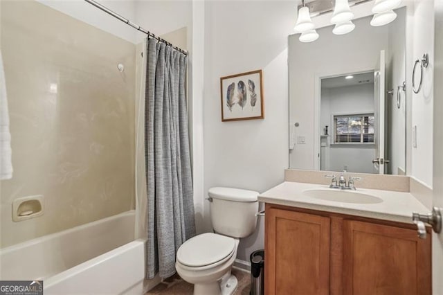 full bathroom with toilet, vanity, and shower / bathtub combination with curtain
