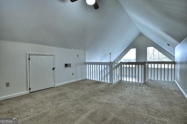 bonus room with lofted ceiling, carpet flooring, visible vents, and ceiling fan