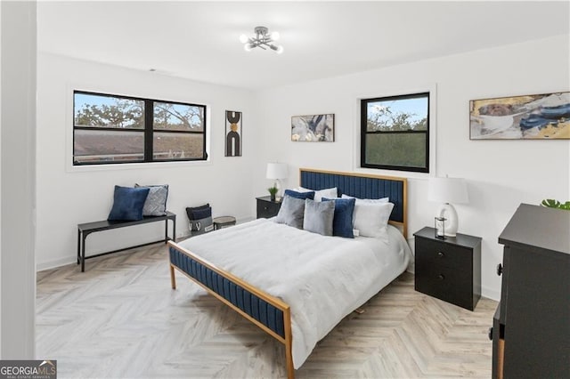 bedroom featuring baseboards