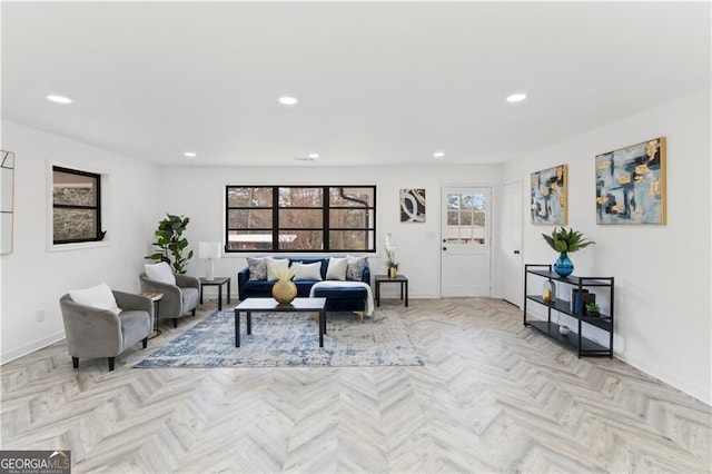 living room with recessed lighting, baseboards, and plenty of natural light