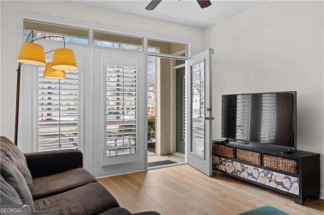 entryway featuring ceiling fan and wood finished floors