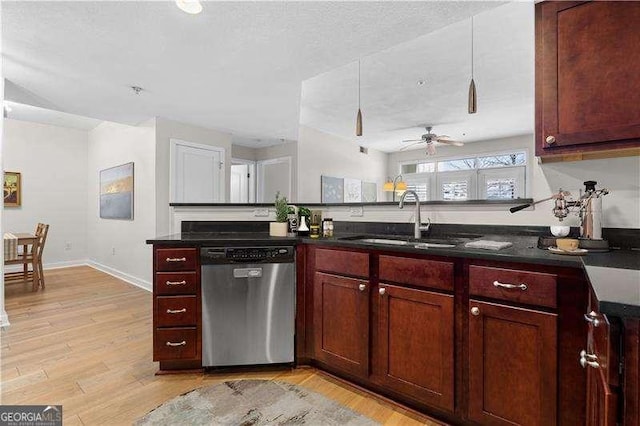 kitchen with a sink, dishwasher, a ceiling fan, and light wood finished floors