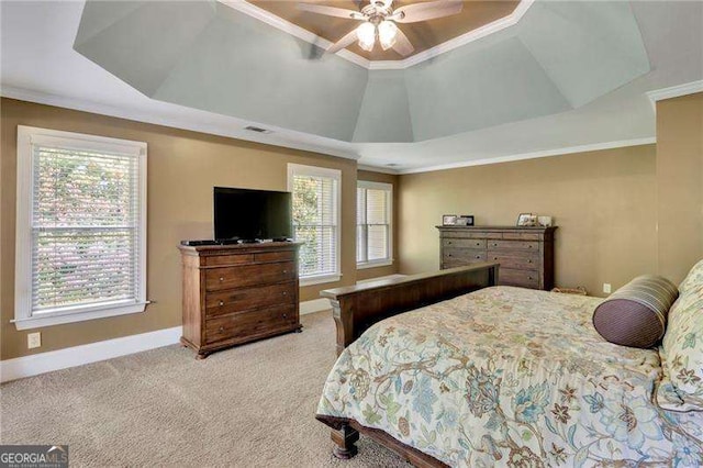 bedroom featuring baseboards, crown molding, carpet, and vaulted ceiling