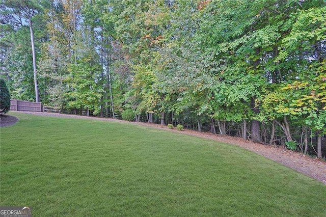 view of yard featuring fence