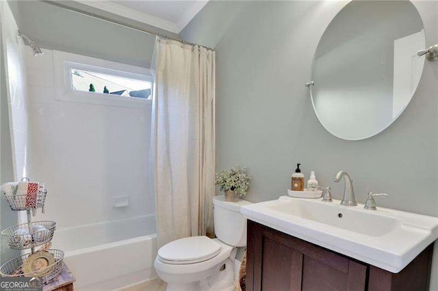 bathroom with shower / bathtub combination with curtain, toilet, and vanity