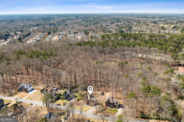 bird's eye view with a view of trees