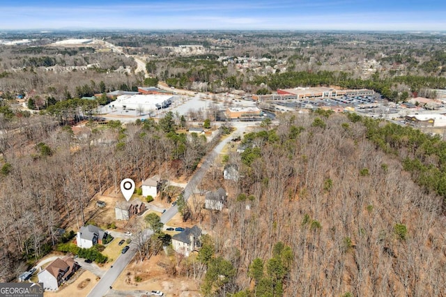 aerial view featuring a forest view