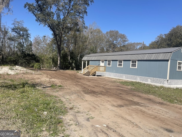 manufactured / mobile home with metal roof and a gambrel roof