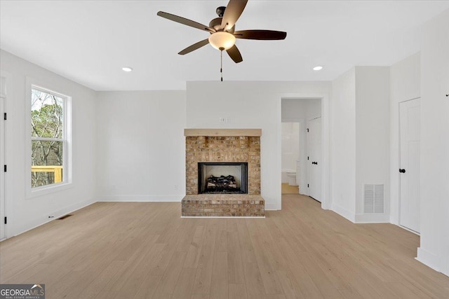 unfurnished dining area with wood finished floors and baseboards
