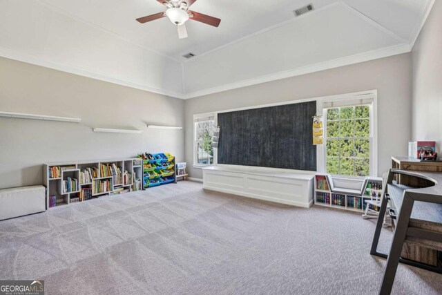 game room featuring visible vents, carpet floors, a ceiling fan, and crown molding