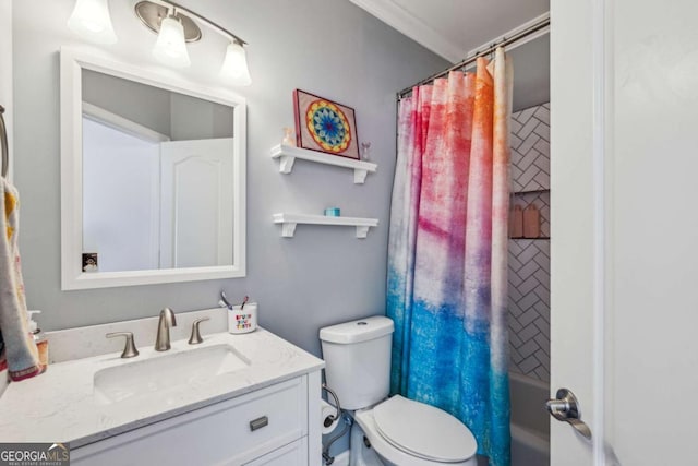 bathroom with toilet, shower / tub combo with curtain, and vanity