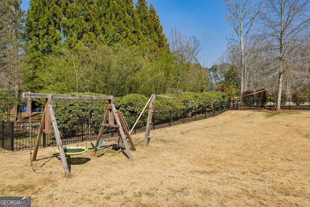 view of play area featuring fence