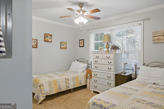 bedroom with a ceiling fan, carpet floors, and ornamental molding