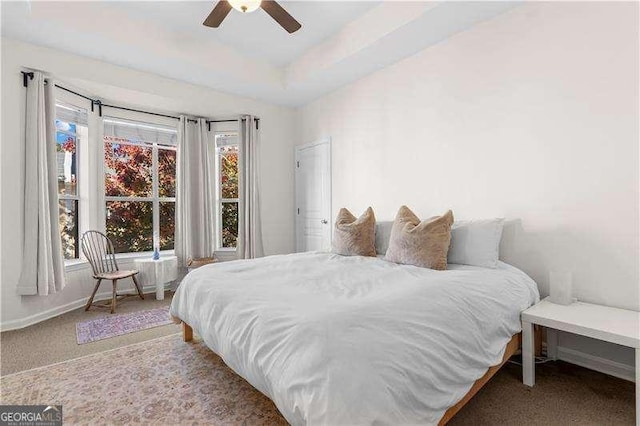 bedroom featuring carpet flooring, ceiling fan, and baseboards